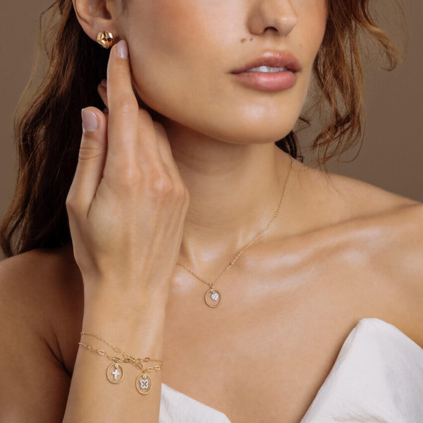 Zlatna narukvica Glossy Cross