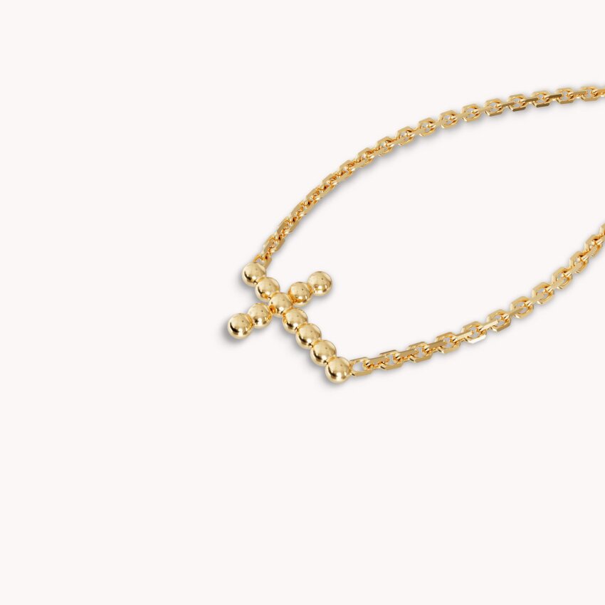 Zlatna ogrlica s privjeskom križa