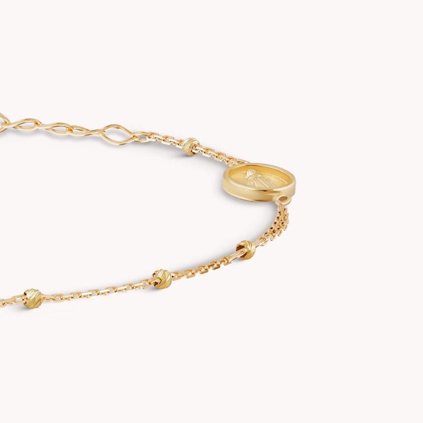 Zlatna narukvica Vjerski detalji