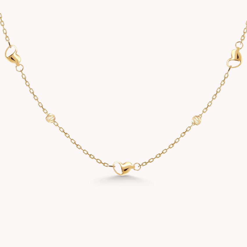 Zlatna ogrlica Neobična srca s detaljima